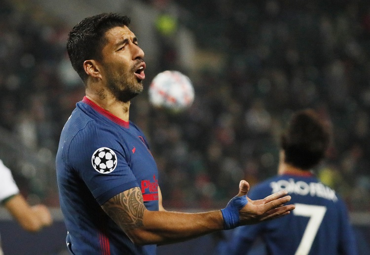 Luis Suarez's positive coronavirus test means he'll miss a reunion with Messi when Atletico play Barcelona in La Liga