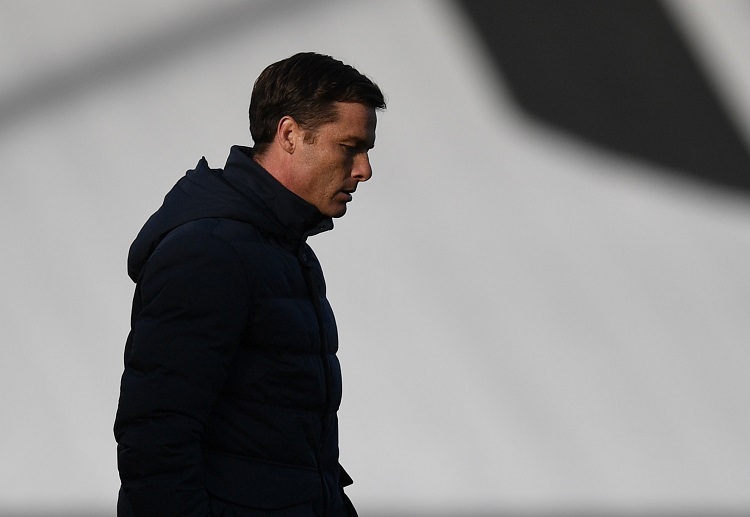 Fulham boss Scott Parker looks dejected as his side face Premier League favourites