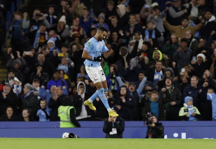 Manchester City forward Riyad Mahrez scores during an EFL Cup match against Chelsea