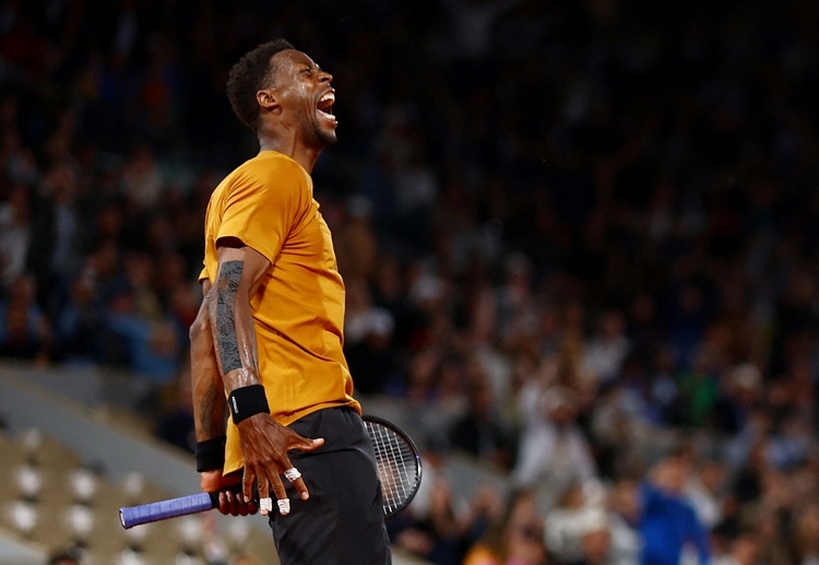 Gael Monfils has beaten Sebastian Baez after five sets to advance to the second round of the 2023 French Open